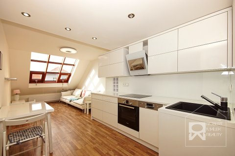 Obývací pokoj s kuchyňským koutem