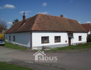 Prodej rodinného domu  s velkými technickými prostory v Ostrově.